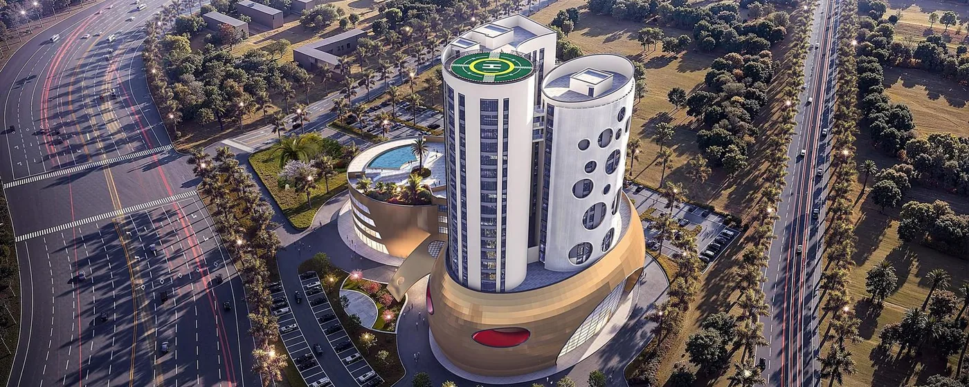 Aerial render of Tri-Tower Abuja with its helipad, podium pool terrace and landscaped grounds
